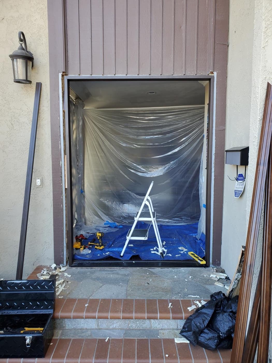 Entry-door replacement — prepped & masked