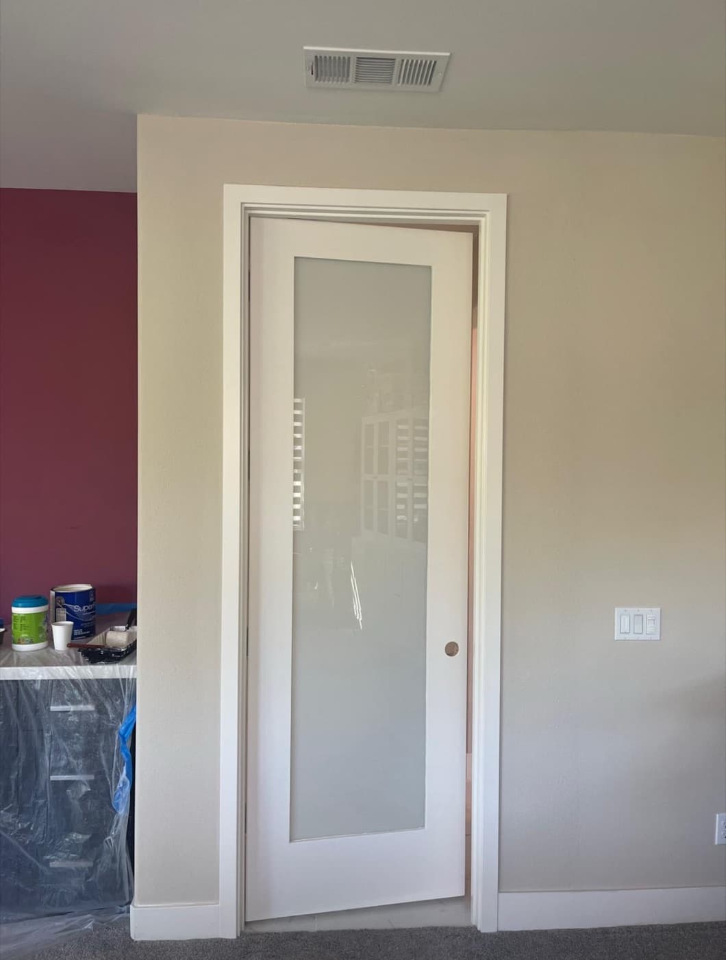 Frosted-glass pocket door, finished